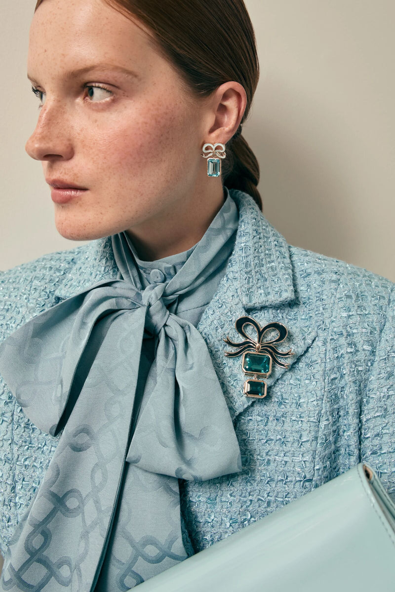Load image into Gallery viewer, Solid Gold and London Blue Topaz Bow Brooch x Philippa Herbert