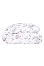 Load image into Gallery viewer, HOME by Suzannah London floral patterned quilt on a white background
