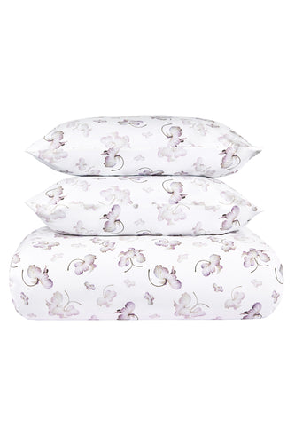 HOME by Suzannah London floral patterned bedding set on a white background