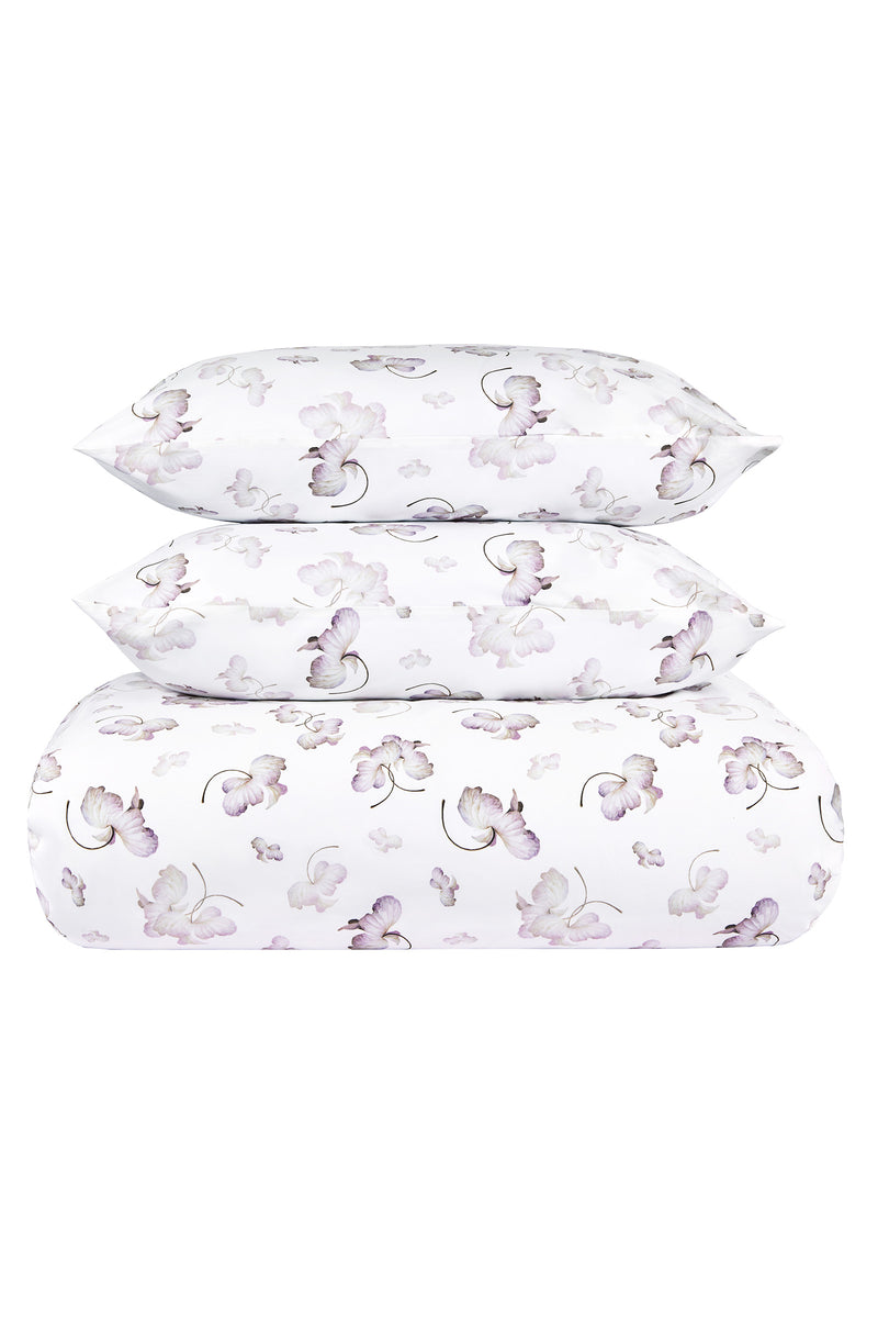 HOME by Suzannah London floral patterned bedding set on a white background