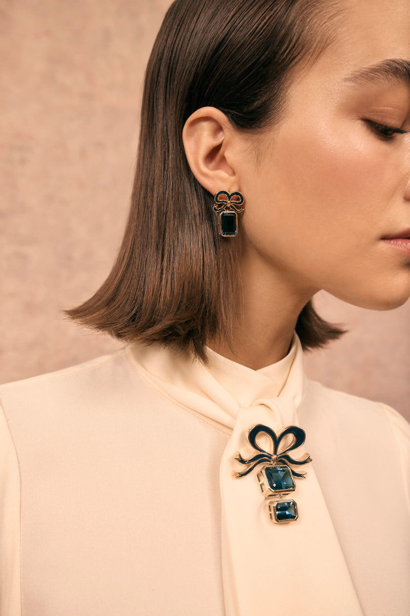 Load image into Gallery viewer, Solid Gold and Topaz Bow Earrings London Blue x Philippa Herbert